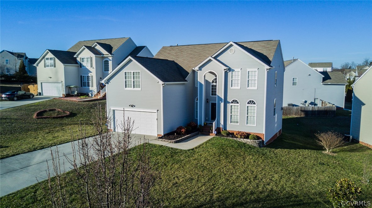3006 Burley Ridge Terrace Chester, VA 23831 - Photo 34 of 37 a front view of a house with garden