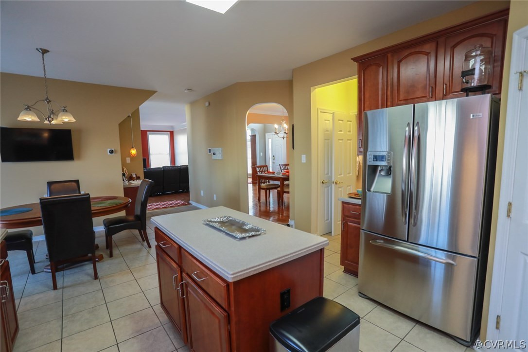 3006 Burley Ridge Terrace Chester, VA 23831 - Photo 4 of 37 a kitchen with stainless steel appliances a refrigerator and a stove top oven