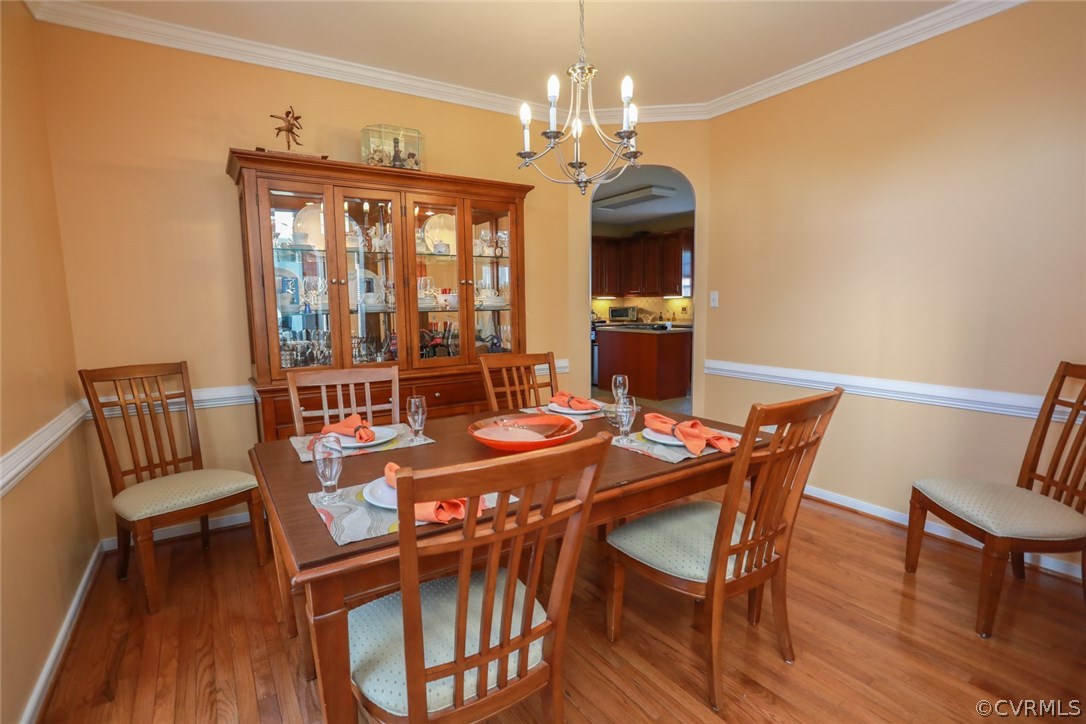 3006 Burley Ridge Terrace Chester, VA 23831 - Photo 8 of 37 a view of a dining room with furniture window and wooden floor