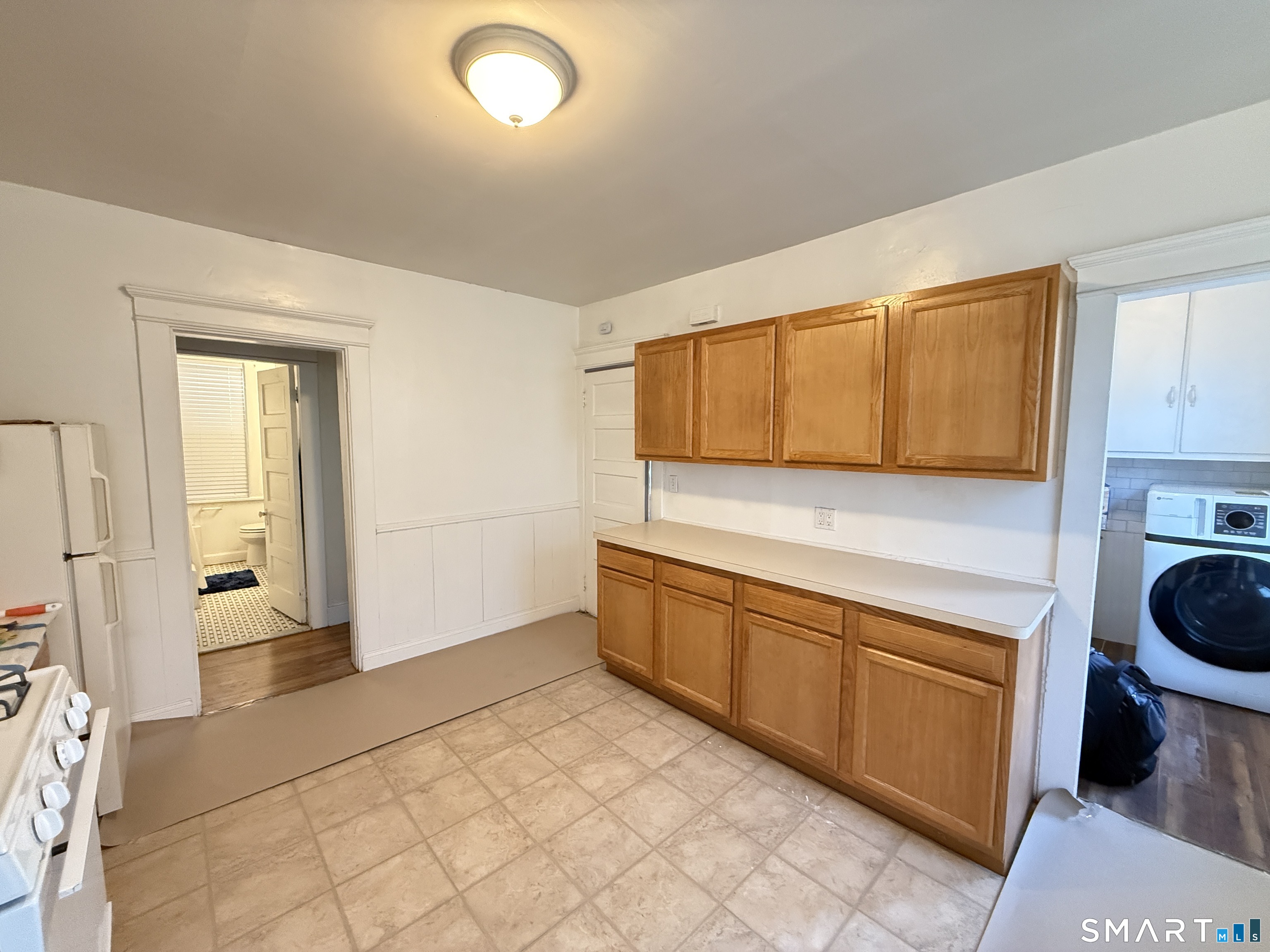 867 Elm Street New Haven, CT 06511 - Photo 12 of 20 a kitchen with a sink and a stove top oven