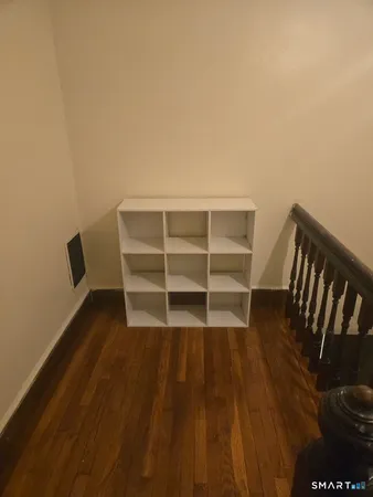 a view of a room with wooden floor and floors