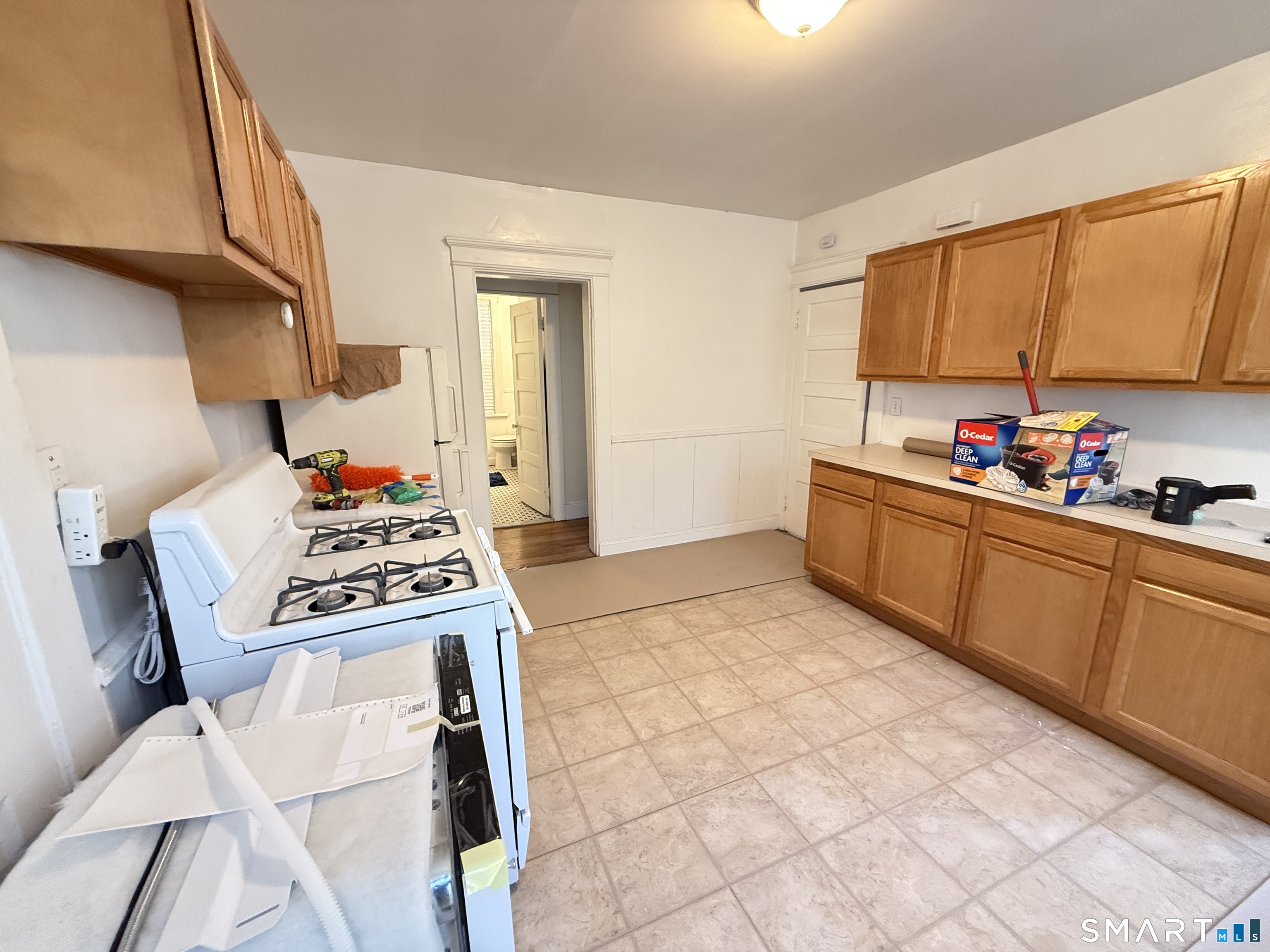 867 Elm Street New Haven, CT 06511 - Photo 9 of 20 a kitchen with stainless steel appliances a sink stove and cabinets