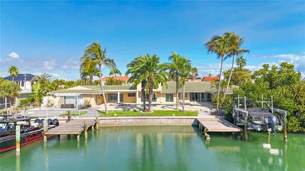 an aerial view of a house with a garden