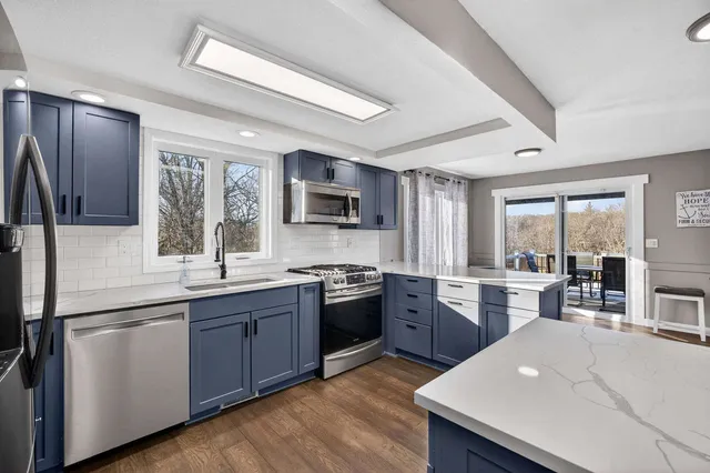a living room with furniture and a table