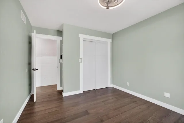 a view of a chairs and table in the patio