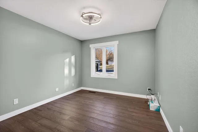 a view of a terrace with yard and mountain view in back