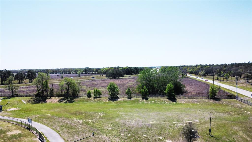 1290 Anderson Snow Road Spring Hill, FL 34609 - Photo 4 of 21 a view of a garden with houses