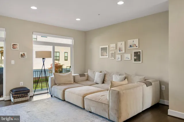 a kitchen with granite countertop a stove and a refrigerator