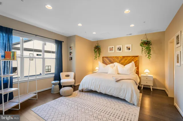 a view of a house with a yard balcony and furniture