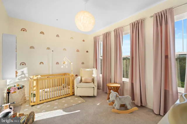 a bathroom with a shower sink and mirror