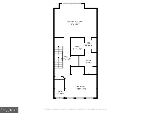 a picture of a bench in front of a wall