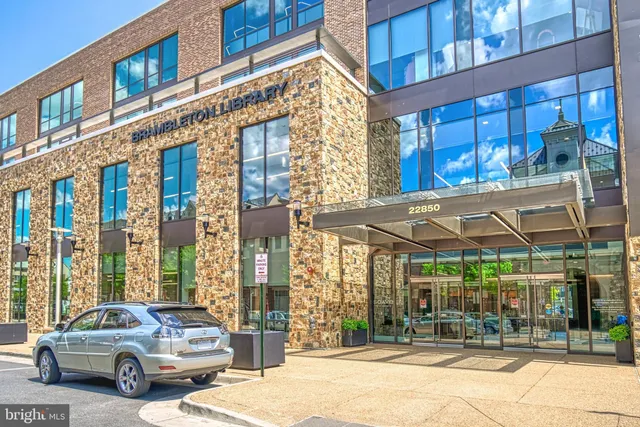a view of a brick building from a balcony