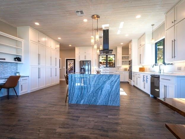 4468 Chapel Road Graham, TX 76450 - Photo 11 of 40 Lots of Kitchen Storage and an Office area.