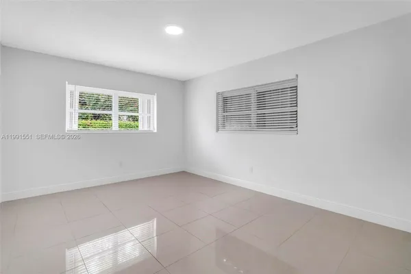 an empty room with a window