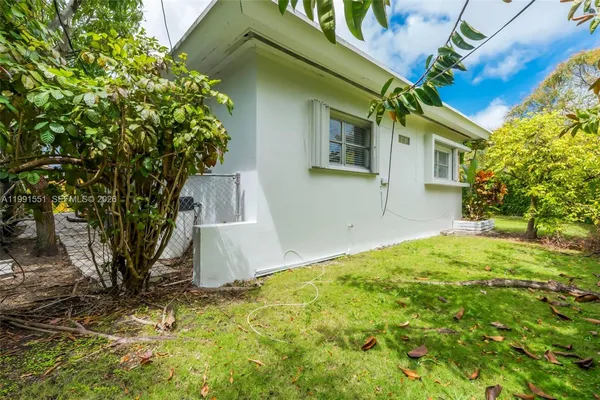a view of backyard of house