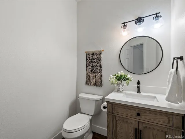 a kitchen with stainless steel appliances a refrigerator sink and microwave