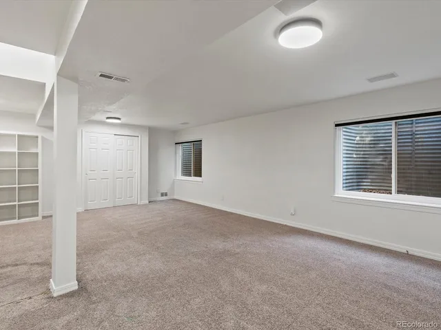 a view of a garden from a balcony