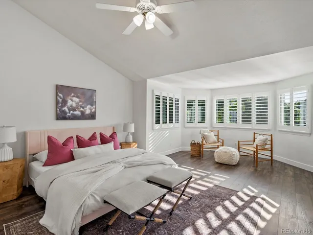 a view of a dining room with furniture windows and wooden floor