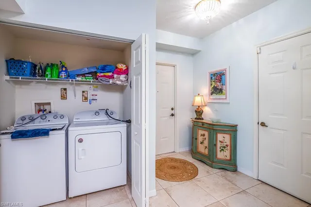 a storage room with washer and dryer