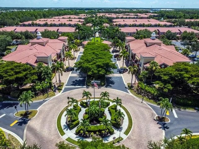 an aerial view of a swimming pool and mountain view