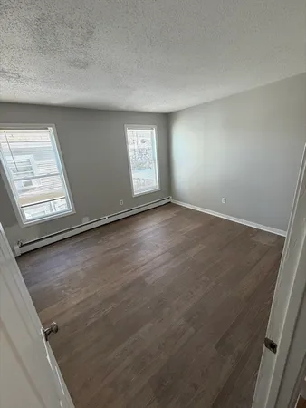 an empty room with windows