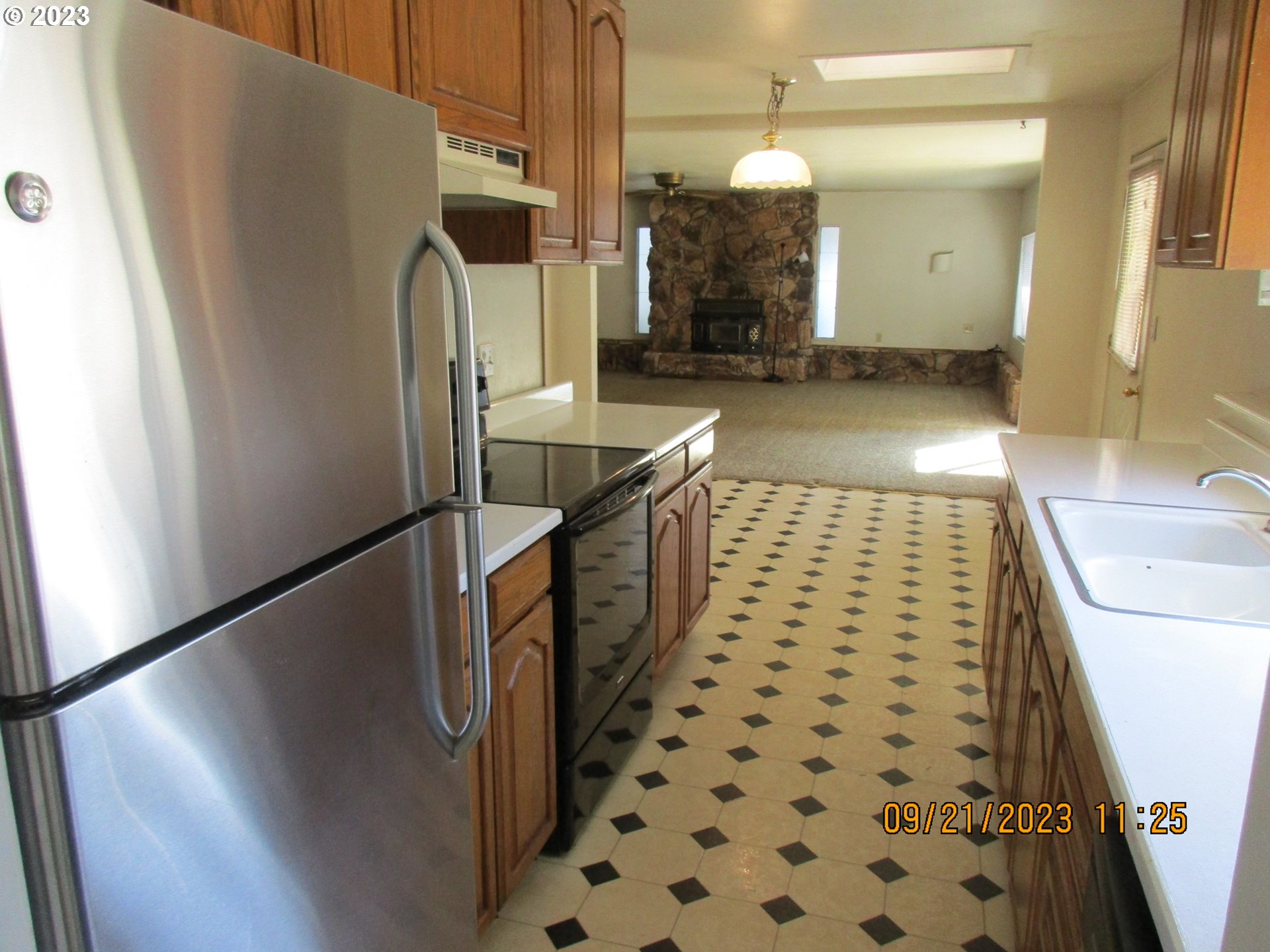 4609 Melrose Road Roseburg, OR 97471 - Photo 3 of 17 a bathroom with a sink a mirror and shower