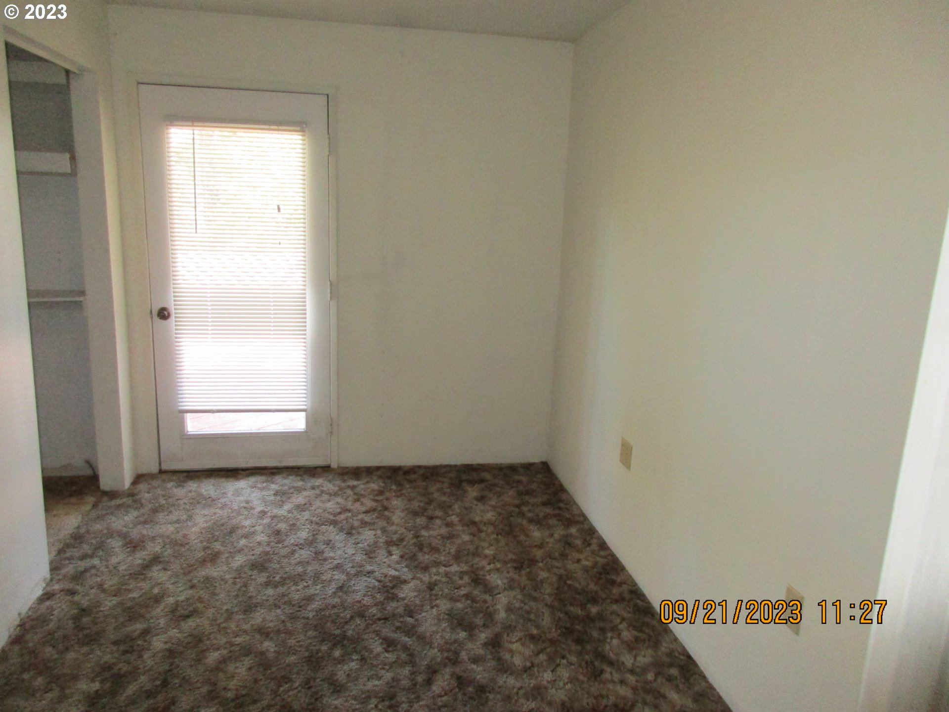 4609 Melrose Road Roseburg, OR 97471 - Photo 6 of 17 a view of an empty room and window