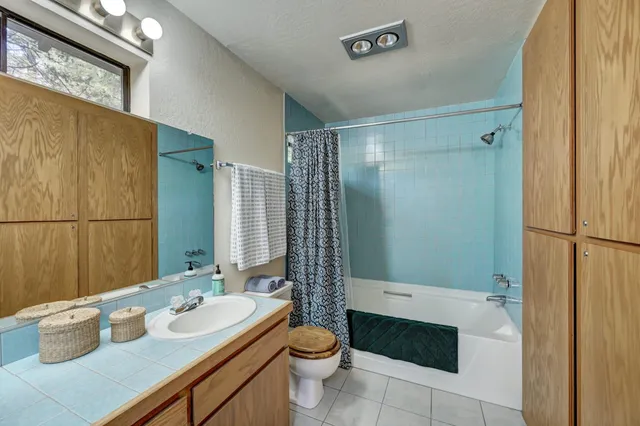 a front view of a house with lake