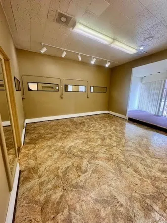 a bathroom with a sink and a shower