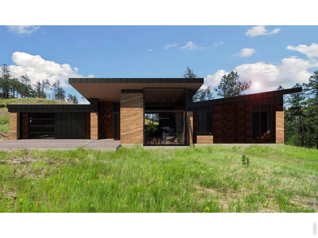 620 Davis Ranch Road Bellvue, CO 80512 - Photo 16 of 18 a black and white building with a yard