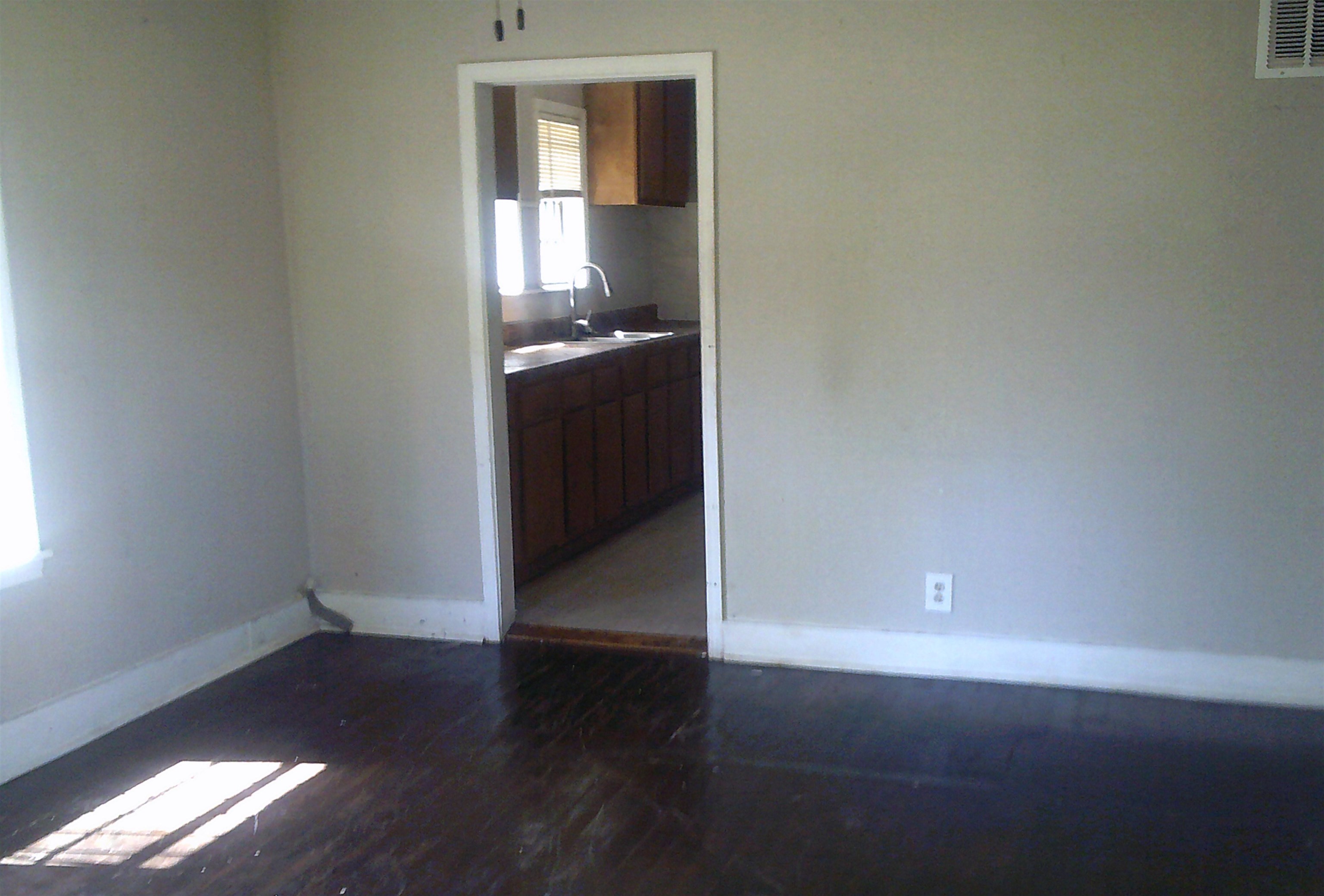 3075 Lotus Road Memphis, TN 38109 - Photo 2 of 14 Unfurnished dining area with light wood finished floors and baseboards
