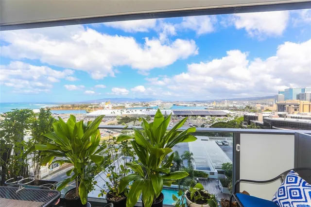a view of a balcony with plants