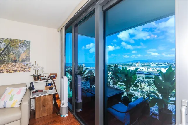 a room with furniture and garden view