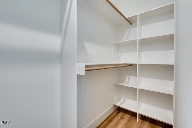 a view of an empty walk in closet