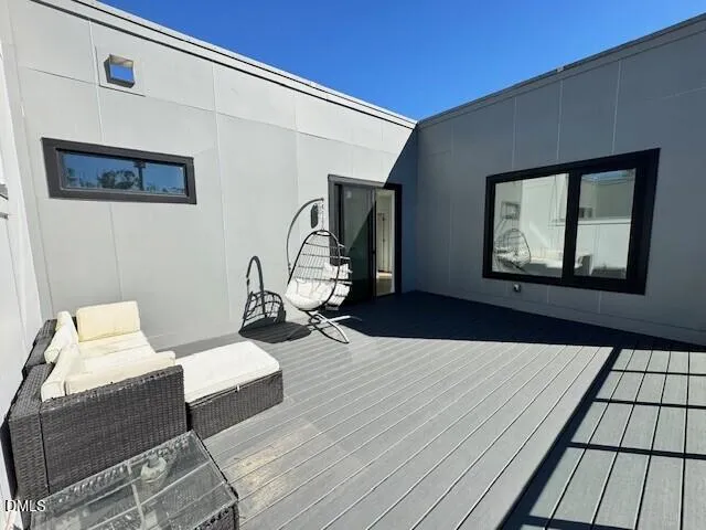 a bedroom with bed and a window