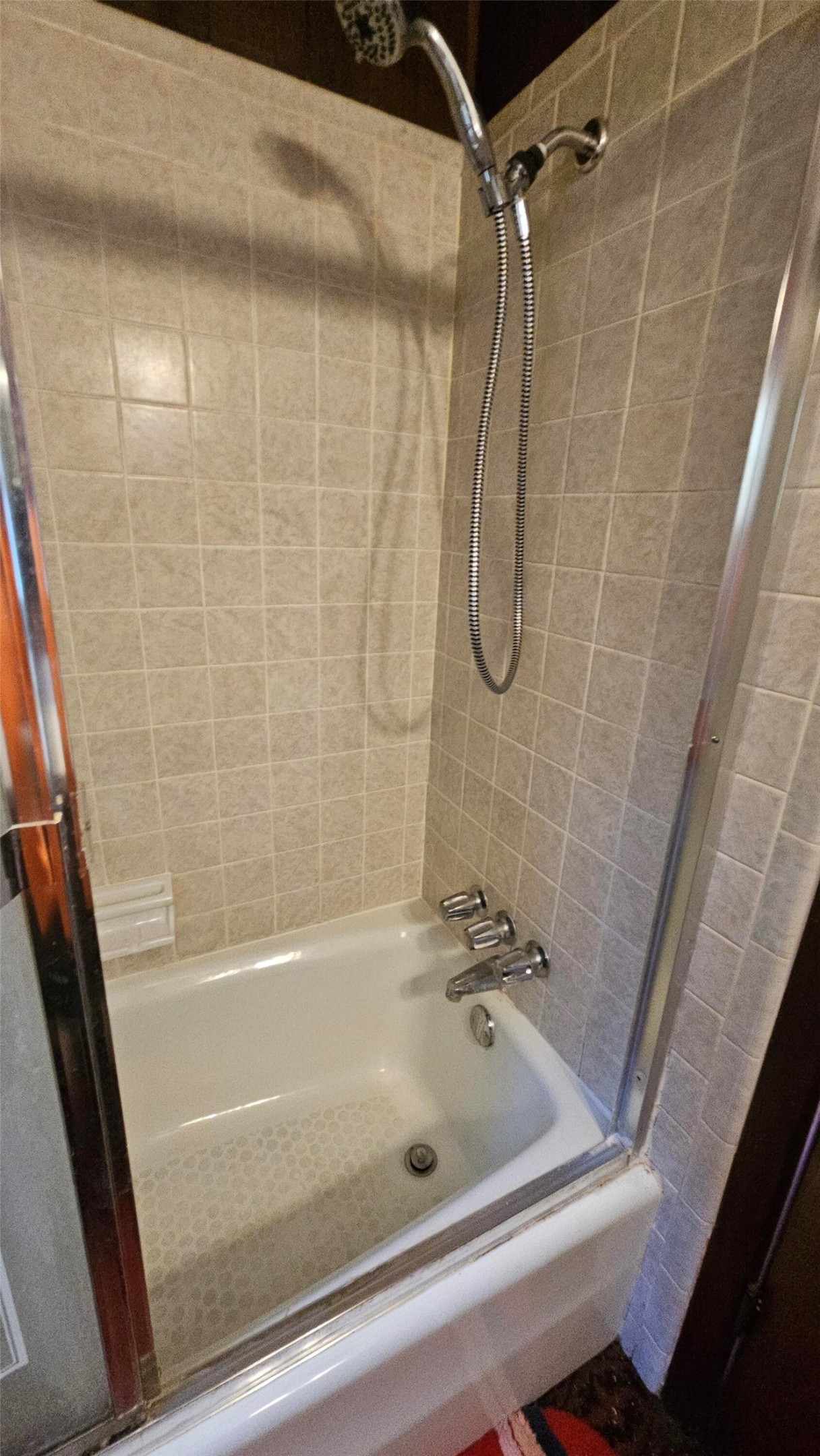940 Coleman Avenue Pasadena, TX 77506 - Photo 18 of 18 a bathroom with a tub and a shower