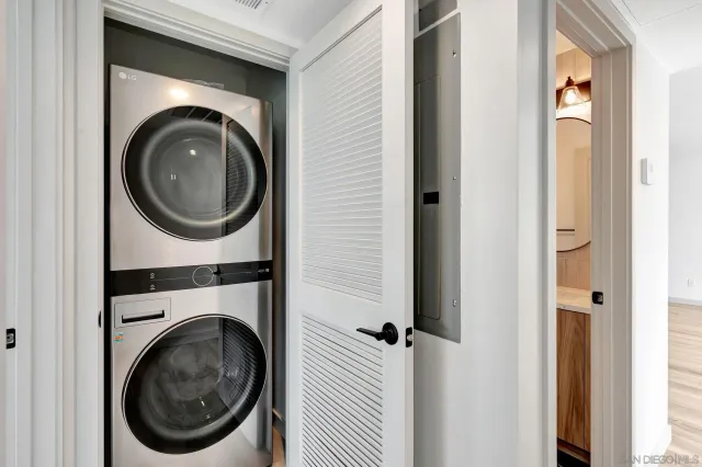 a terrace with outdoor seating and city view