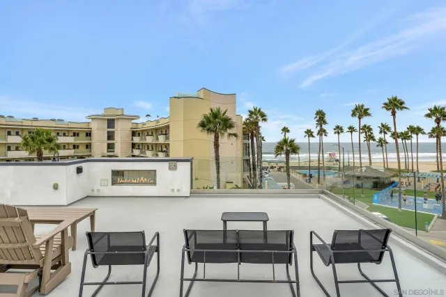 a view of swimming pool with outdoor seating