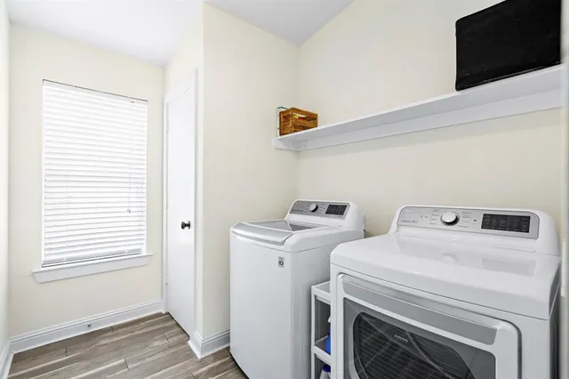 a utility room with dryer and washer