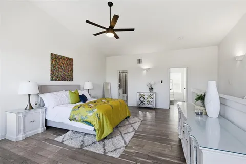 a bed room with a bed and a couch