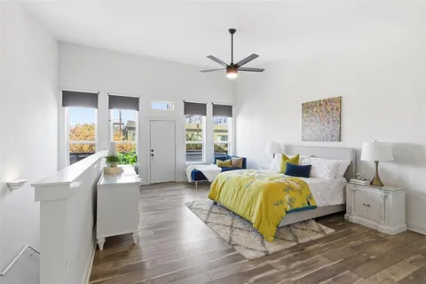 a bed room with two bed and a chandelier