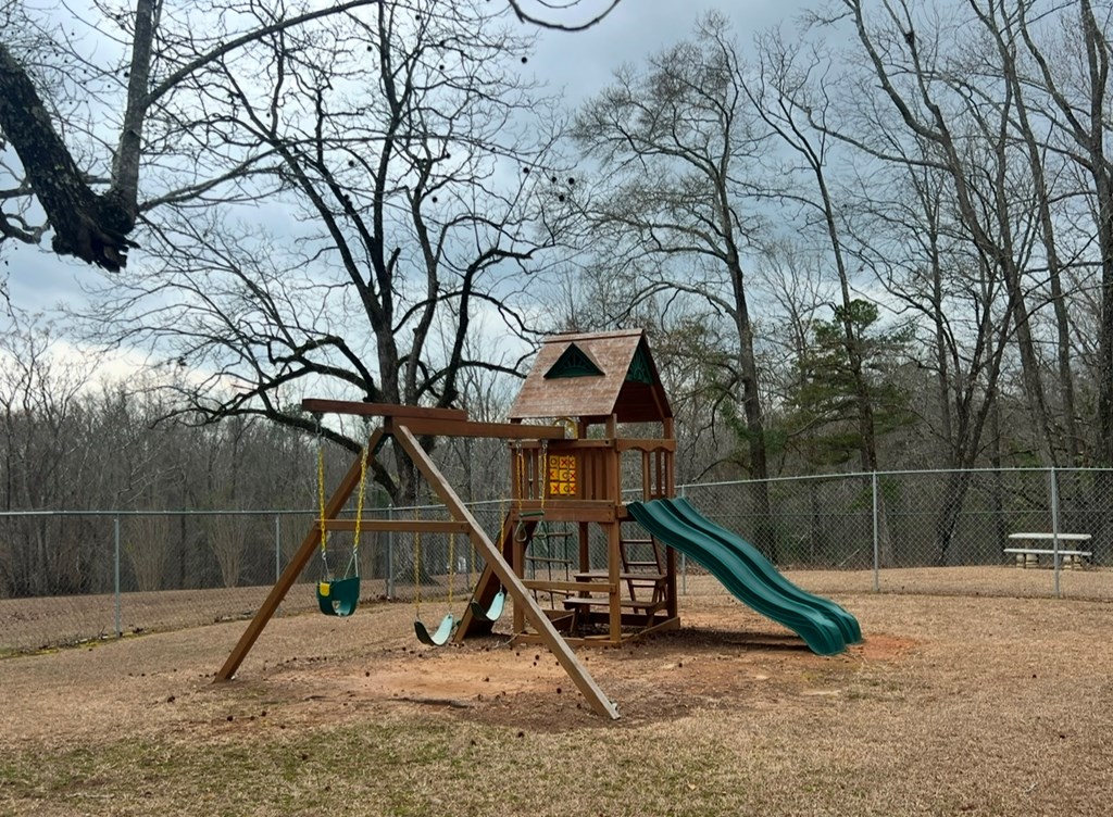 0 Heather Circle Waverly Hall, GA 31831 - Photo 2 of 5 a view of a house with a park