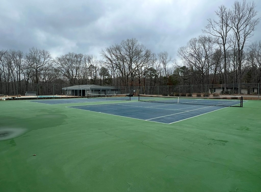 0 Heather Circle Waverly Hall, GA 31831 - Photo 3 of 5 a view of outdoor space with green field and trees