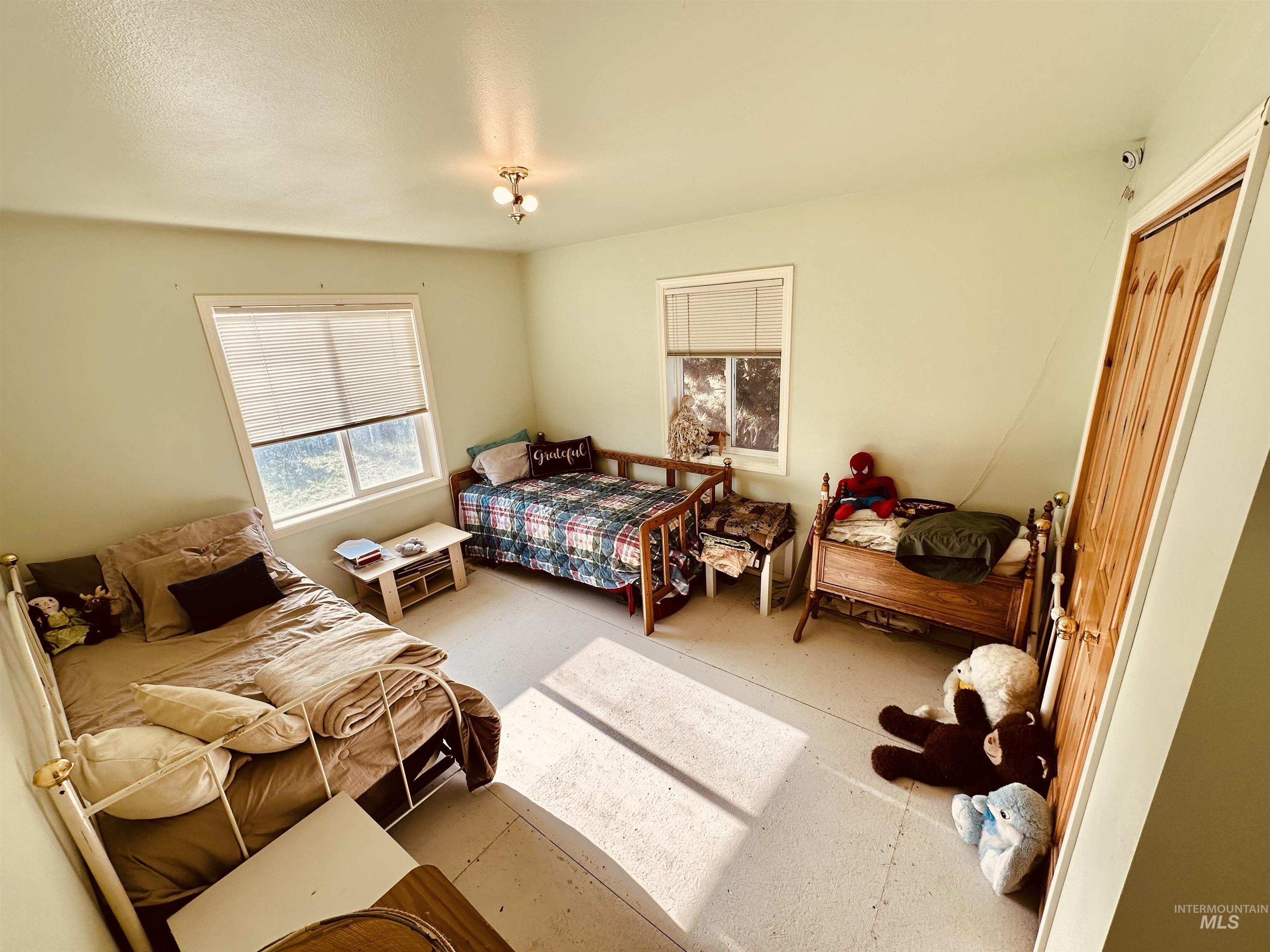 1049 Grand Avenue Nyssa, OR 97913 - Photo 27 of 50 Interior room featuring light green walls and light-colored flooring