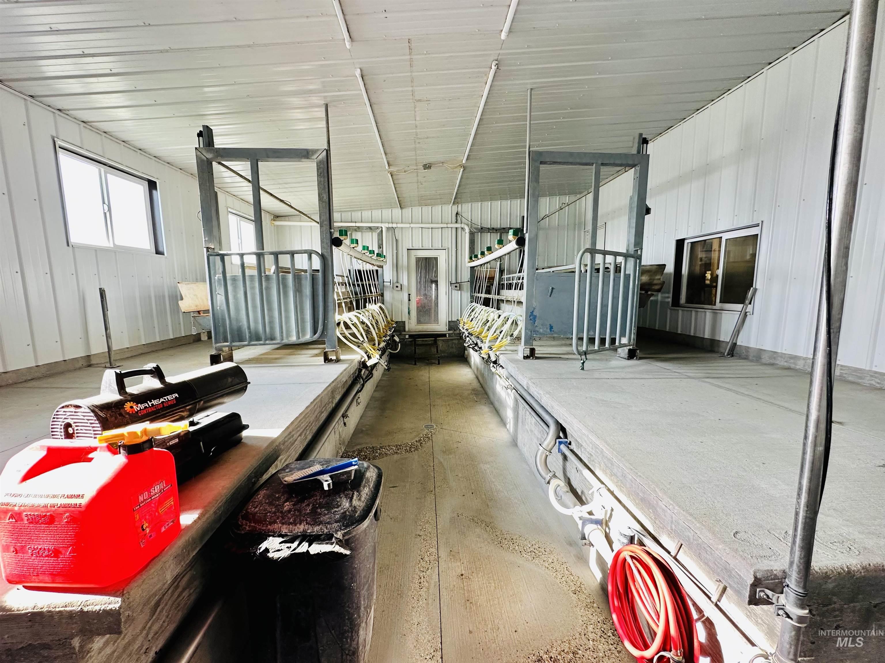 1049 Grand Avenue Nyssa, OR 97913 - Photo 39 of 50 Industrial interior featuring concrete flooring and white paneled walls