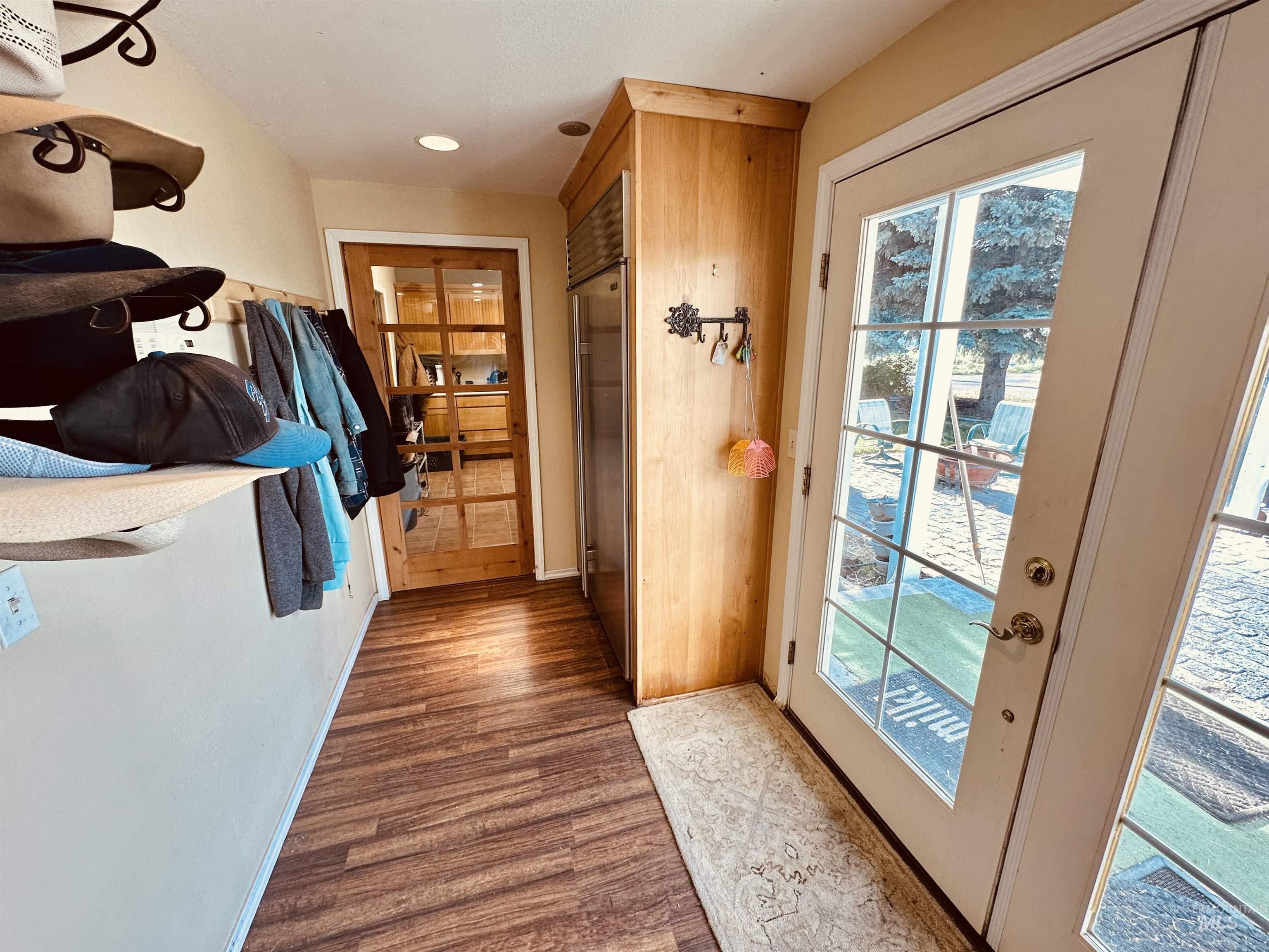 1049 Grand Avenue Nyssa, OR 97913 - Photo 4 of 50 Wood-finish flooring throughout, complemented by recessed lighting