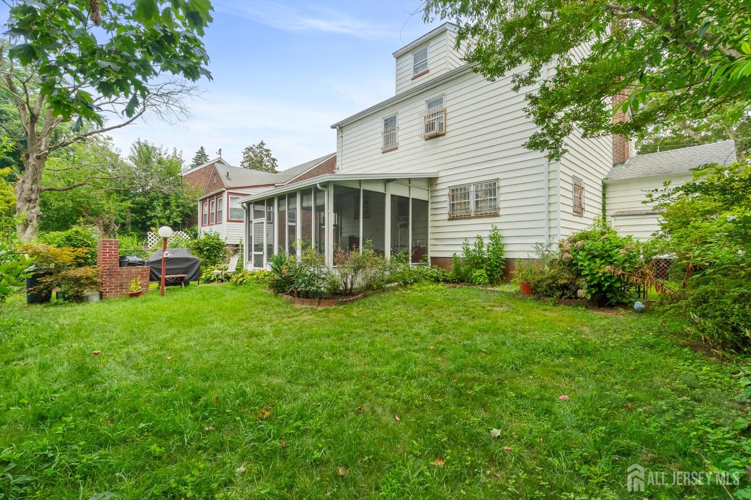 72 Bailey Avenue Hillside, NJ 07205 - Photo 15 of 20 a view of a house with backyard and garden