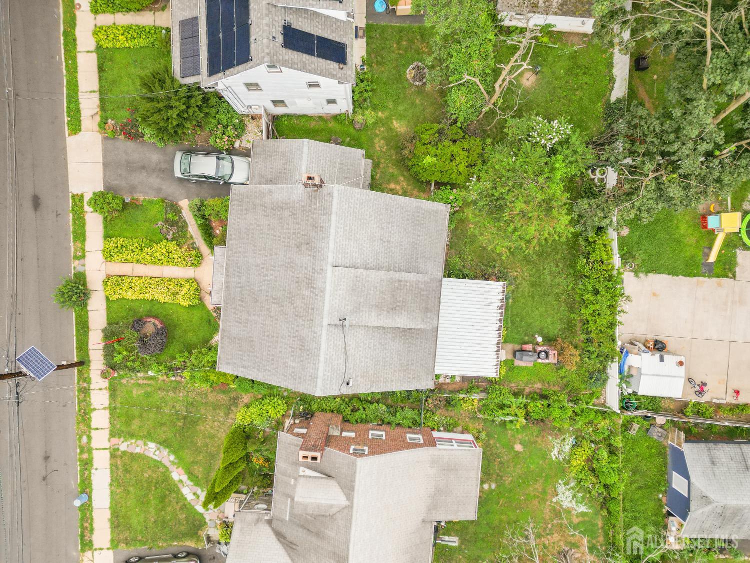 72 Bailey Avenue Hillside, NJ 07205 - Photo 17 of 20 an aerial view of a house with a yard and garden