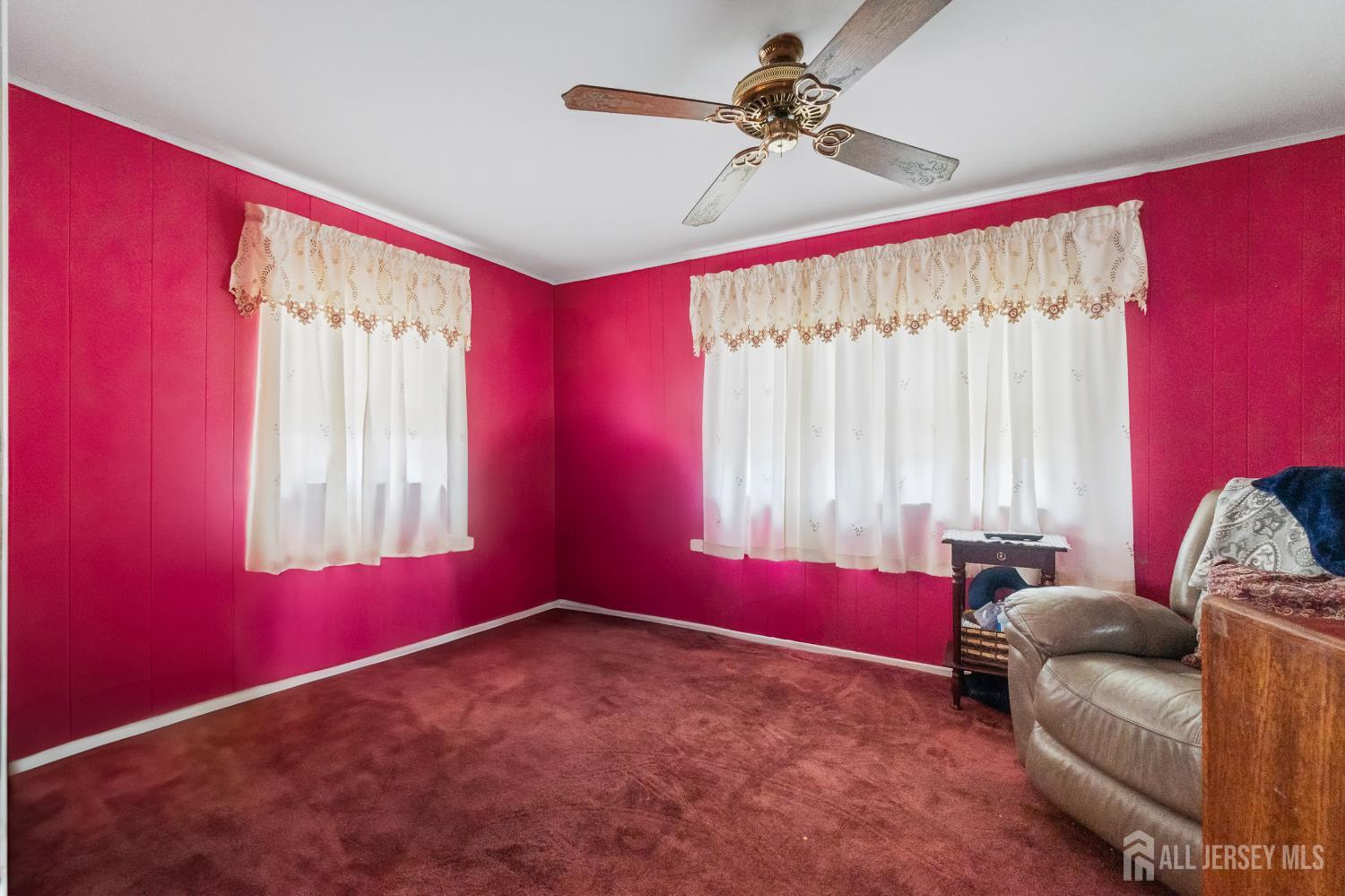 72 Bailey Avenue Hillside, NJ 07205 - Photo 6 of 20 a living room with furniture and a window