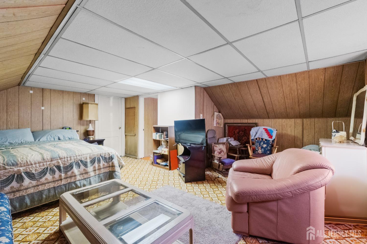 72 Bailey Avenue Hillside, NJ 07205 - Photo 10 of 20 a bed room with a bed and a couch